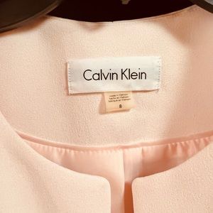 Never worn.No tag. Calvin Klein long light pink blazer . Size 8